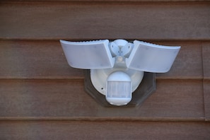 An automatic sensor night lights up the drive way