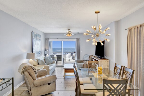 Living room features sleeper sofa for 2, 2 recliners and Smart TV
