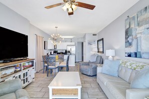 Living room features sleeper sofa for 2, 2 recliners and Smart TV