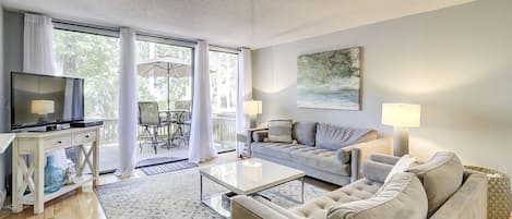 First floor living area with deck overlooking the lagoon. 