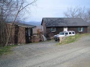 Cabin with utility building to store ski equipment or sleds