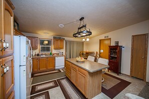 The kitchen is fully functional and stocked with pots, pans and what you need.