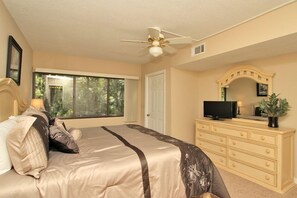 Master bedroom showing balcony access