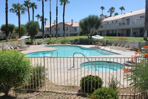 Pool and hot tub behind the condo.  One of 25 pools.