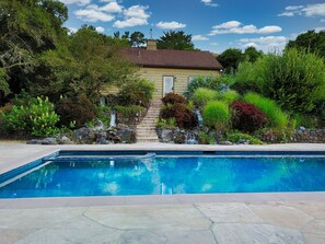 Sits on a 3+ acre safe & secluded property with private pool