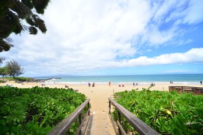 This is the fun beach directly across the street, Kamaole 2. Safe & lifeguarde