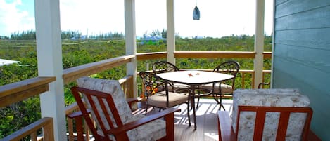 Patio with gas grill and seating, not to mention views.