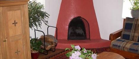 The 'Kiva' fireplace - a little wood goes a long way.