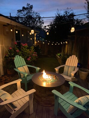 Enjoy some S'Mores by the outdoor fire pit after you relax in the Hot Tub