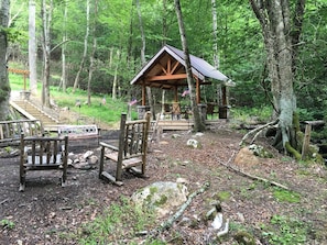Gazebo and fire pit by the creek