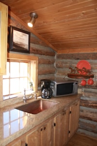 Iconic Log Cabin At The Yellowstone River Ranch