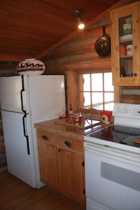 Iconic Log Cabin At The Yellowstone River Ranch