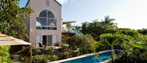 View of Main House from pool and garden.