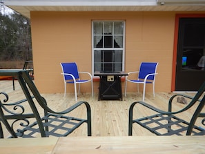 Propane fire pit under kitchen window