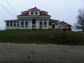 Front of house from road
Note mailbox which is replica of house