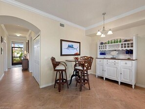 Screened in Front Entry allows cool breezes through Condo 