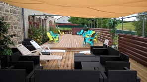 Large south facing terrace 100 sq m leading to alfresco kitchen and garden area