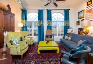 Comfortable light -filled living room with plenty of seating for entertaining 