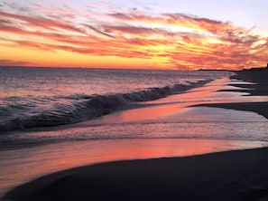Beautiful sunset taken on the beach in front of the condo