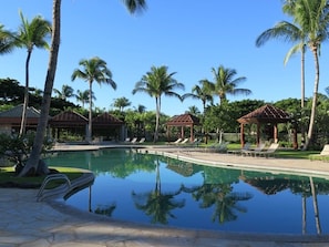 Pool area; pool, children's pool, hot tub, waterfall, pavilion, furnishings.