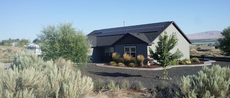 House is located near the middle of about 7 acres reserved for sage grouse habit