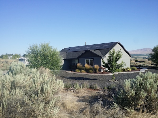 House is located near the middle of about 7 acres reserved for sage grouse habit