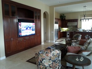 Enjoy the harmony of the 70" 4K Ultra HDTV/Surround Sound + SONOS Music System!