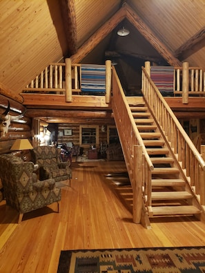 View from kitchen into loft and living room