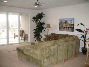 Relaxing family room with T.V., fireplace, and breathtaking  view