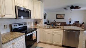 Newly remodeled kitchen w granite countertops, stainless steel appliances