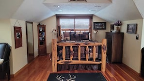 Comfy queen sized log bed with a gorgeous view of the Sapphire Mountains