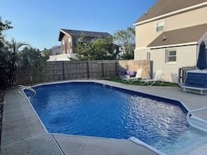 Pool patio area with several Lounge Chairs!