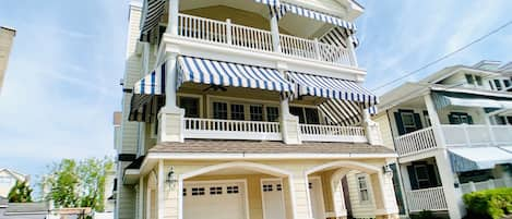 Front & Side of House. Awnings and ceiling fans make a cozy front deck