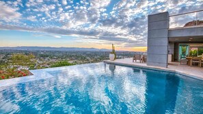 Infinity saltwater pool w/ gorgeous valley views & plenty of patio seating