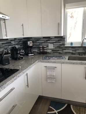 Kitchen has all you need!! Expresso maker and regular drip coffee maker. 