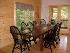 The large dining table will seat 8 guests.