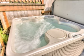 Relax in the hot tub after a day of beach combing.