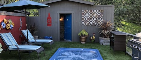 Beautiful Outdoor Deck with Hot Tub, Barbecue and Adjacent Outdoor Shower
