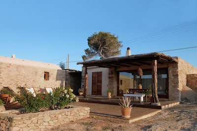 Charming, stone, overlooking Ibiza, 1,200 m2 of private land