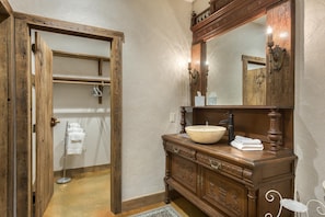 Downstairs bathroom vanity and closet
