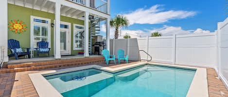 Plenty of shade on the porch to kick back and watch the fun in the pool.