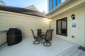 The open deck is a spacious place to enjoy grilling out and dining.