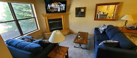 Quick pic of the new loveseat and couch. Forgive the clutter on the counter. :)