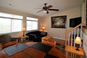 Living and dining area with sleeper queen size couch