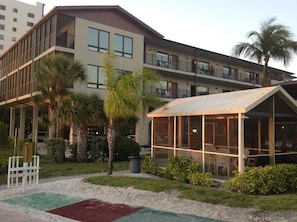 Exterior frontal and south side exterior  view of condo complex