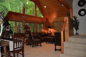 Living room finished in white cedar.