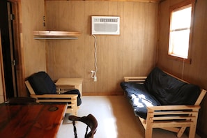 Living area with full size futon. 