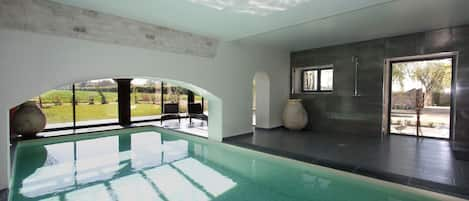 Indoor swimming pool heated to 28°C