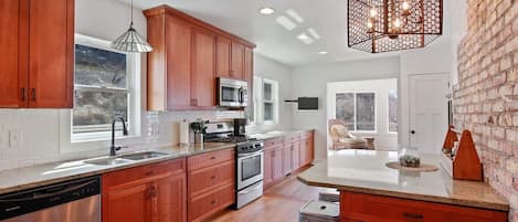 Large kitchen perfect for the whole family.  Eat-in island seats 6. 