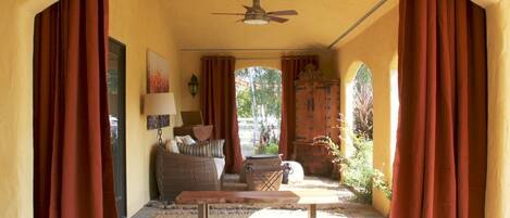 Private loggia with daybed located off of the front Master bedroom